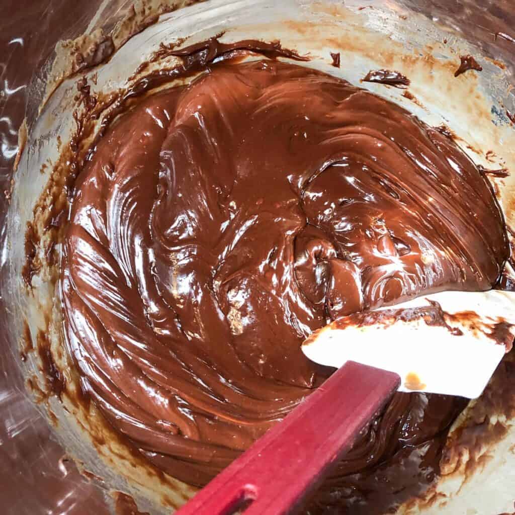 melted chocolate and condensed milk in a double boiler