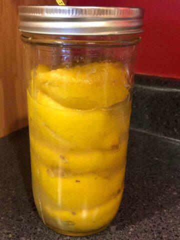 Preserved lemons in a wide mouth canning jar