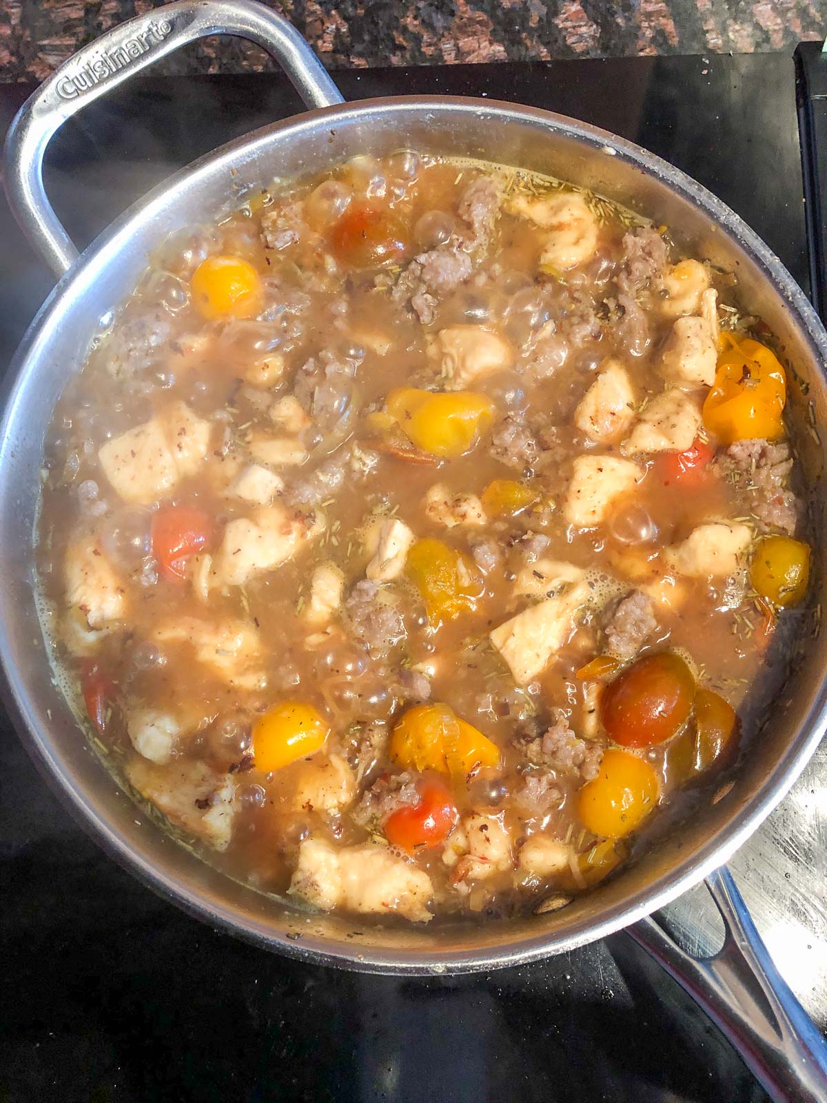 simmering shoemaker's chicken ingredients in skillet